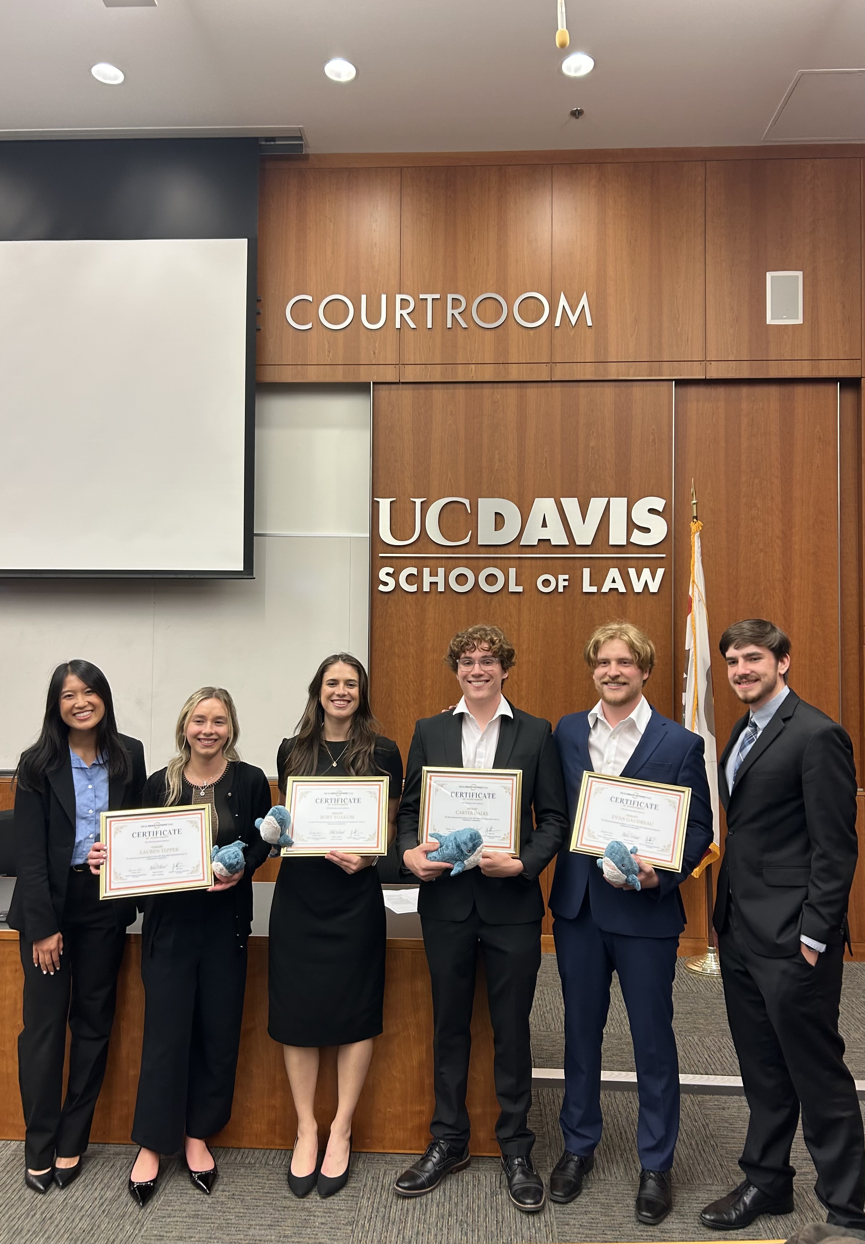From left to right, the King Hall Negotiations Team Competition Chair Julie Tran '27, Lauren Tepper '28, Rory Yoakum '28, Carter Dalke '28, Evan Gaudreau '28, and Competition Chair Cameron Lane '27.