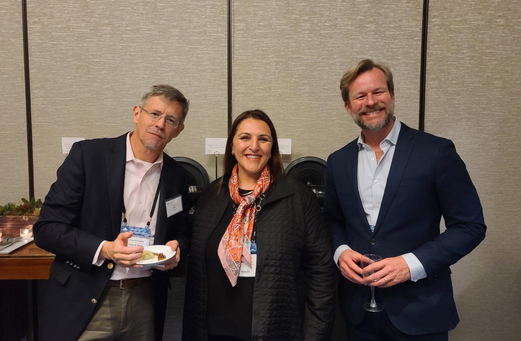 Professors Bill Dodge, left, Afra Afsharipour and Brian Soucek