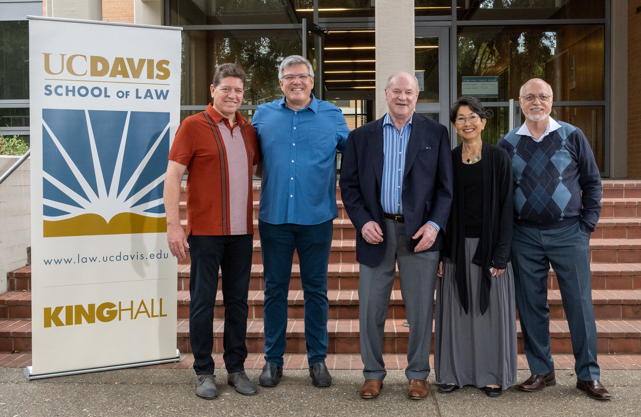 Members of UC Davis Law's Class of 1987 standing in front of King Hall.