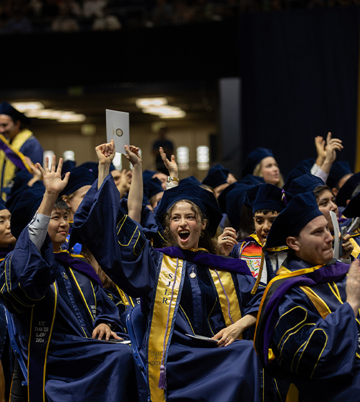 The UC Davis School of Law Class of 2024 cheering at the ARC.