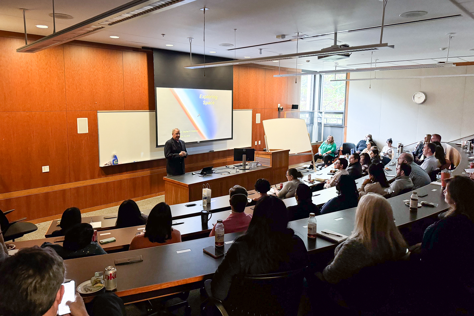 Professor Stephen Robinson speaking to an audience.