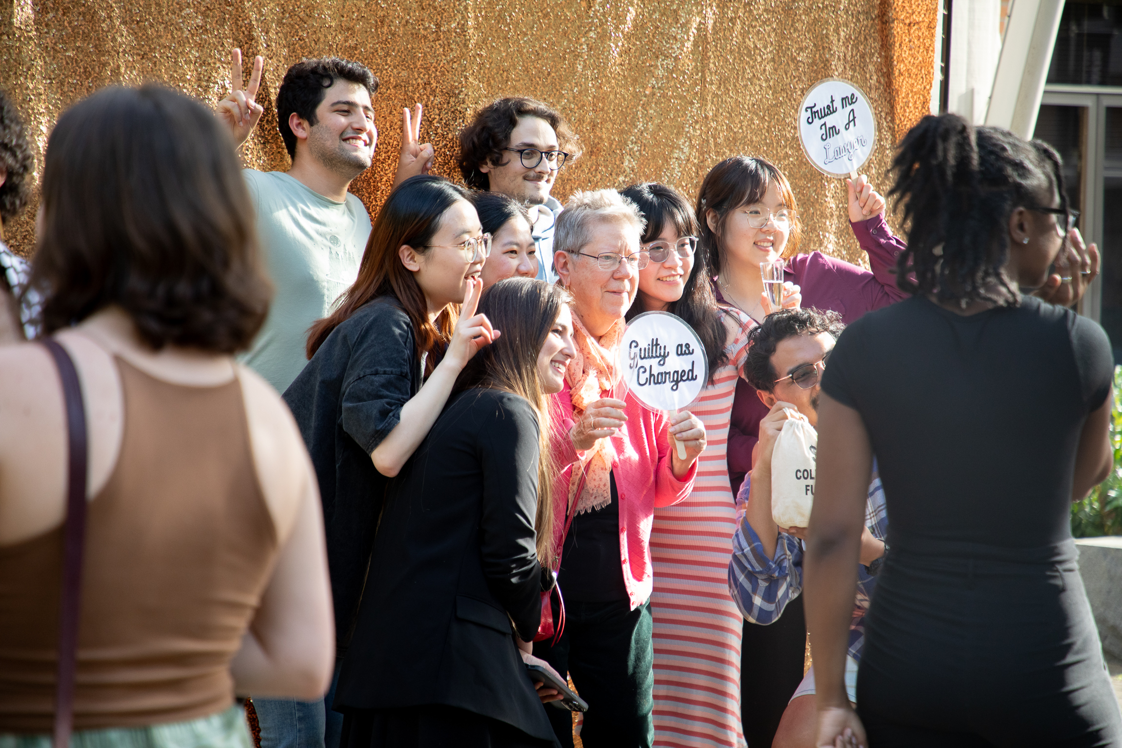 Associate Dean Beth Greenwood, center, posed with international students at the Class of 2024 Celebration.