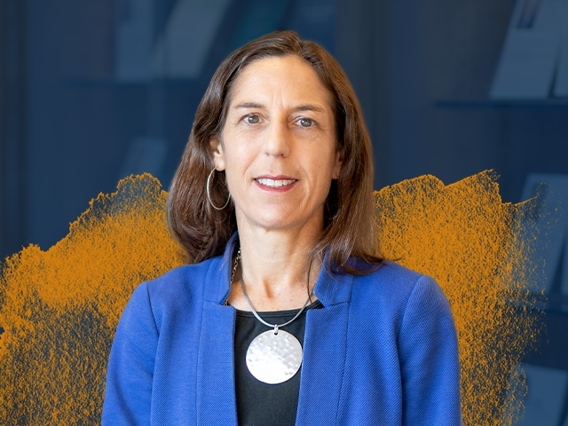 Professor Courtney Joslin with a blue and gold gradient in the background.