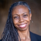 Close-up headshot of Prof. Andrea Chandrasekher